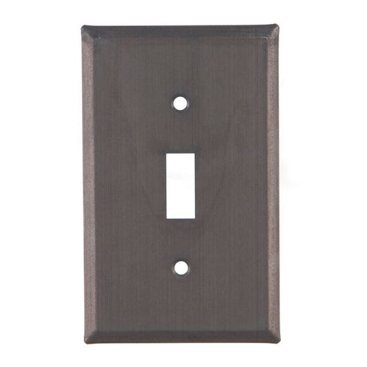 A single switch cover in a kettle black finish, made of metal with a matte lacquer protective coating, designed to fit over a switch on a wall plate.