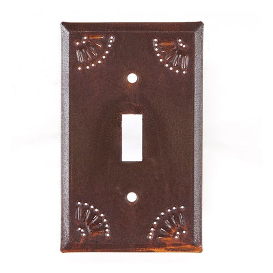 A rustic style single switch cover made of tin with a chisel design around the edge, featuring a matte lacquer protective coating.