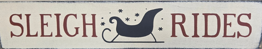 Decorative sign with 'Sleigh Rides' text and a sleigh illustration on a white background.