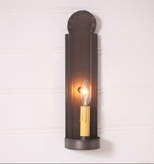 Wall-mounted light fixture with a bulb on a white background