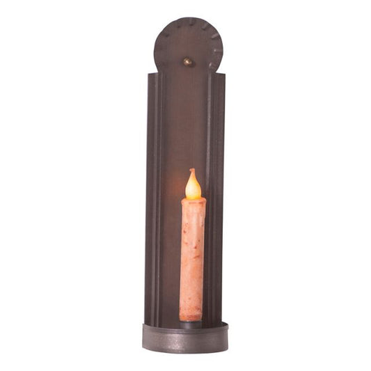 Slim colonial tin candle sconce holding a battery operated taper candle