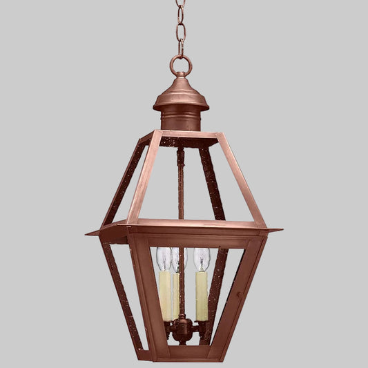 Bronze pendant light fixture on a white background