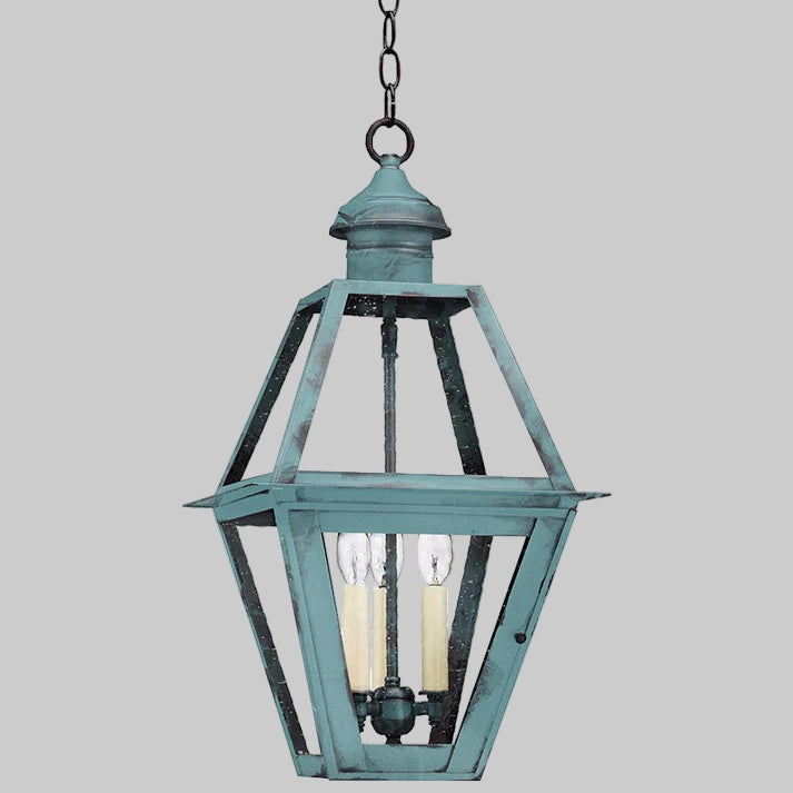 Teal outdoor hanging lantern with two candles on a white background