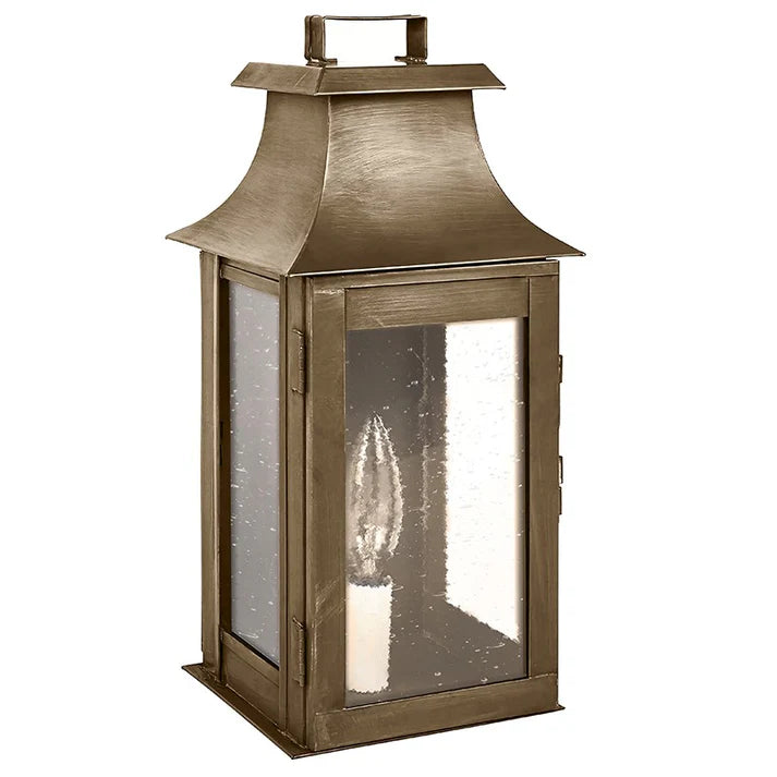 Bronze lantern with glass panels on a white background