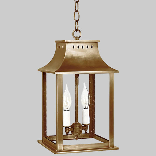 Bronze hanging lantern with two candle-like lights on a white background