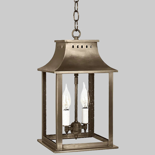 Bronze hanging lantern with two light bulbs on a white background