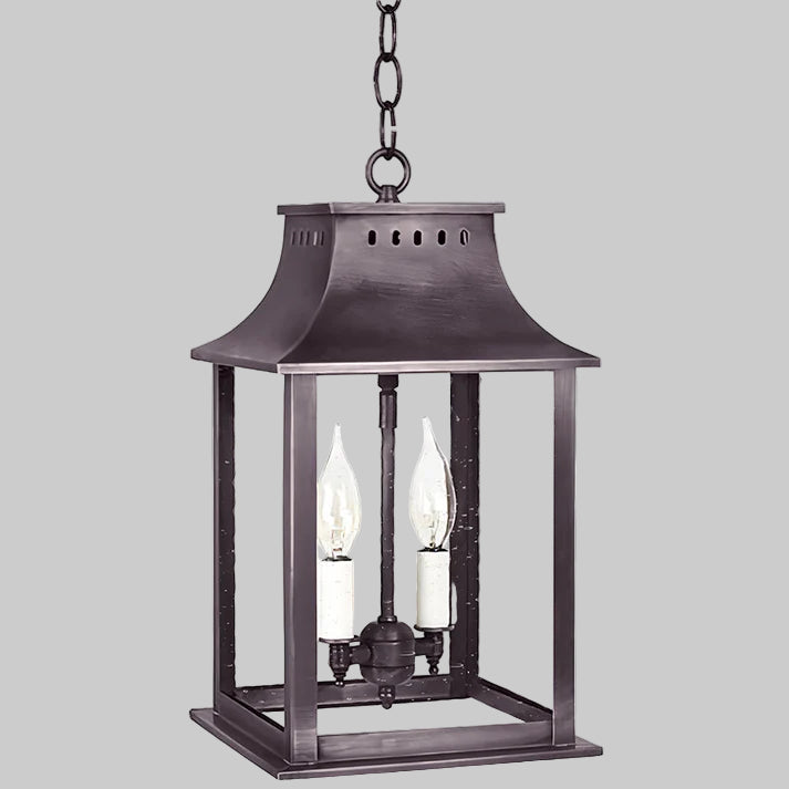 Decorative hanging lantern with two candle-like lights on a white background