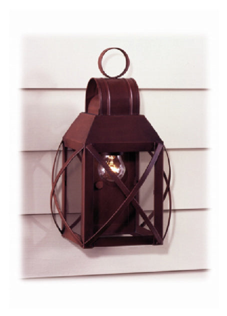 Decorative wall lantern mounted on a white wooden panel