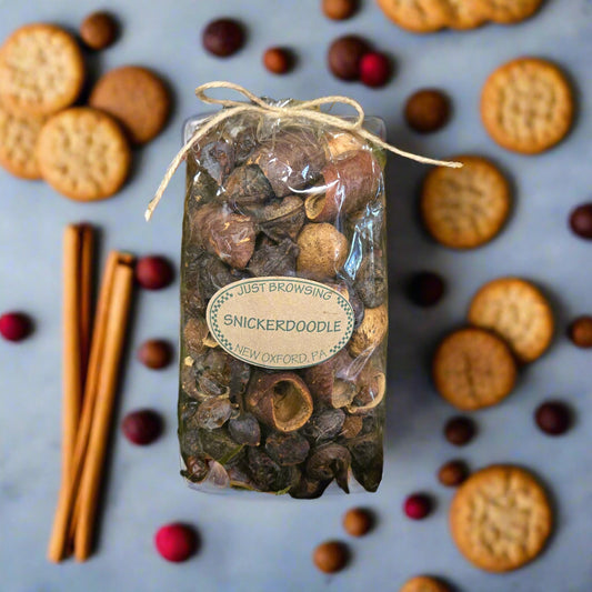 Bag of potpourri with a label on a green leafy background