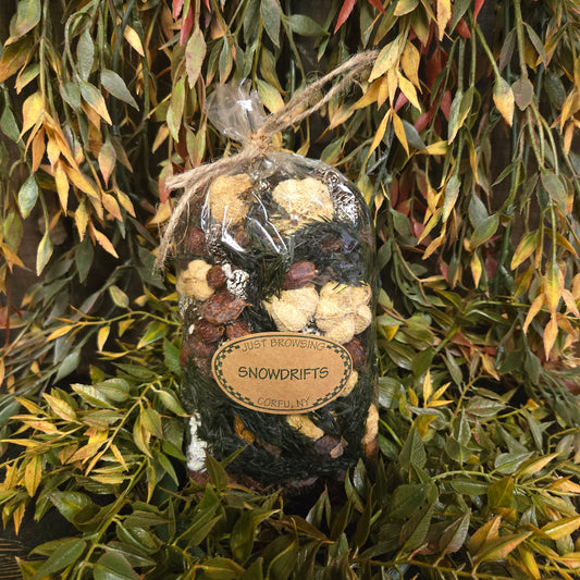 Decorative bundle with a label on a green leafy background