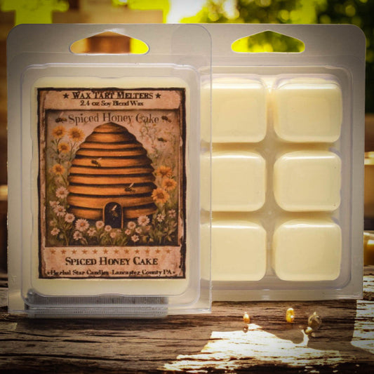 Spiced Honey Cake wax tart melts packaging with a bee hive design on a wooden surface.