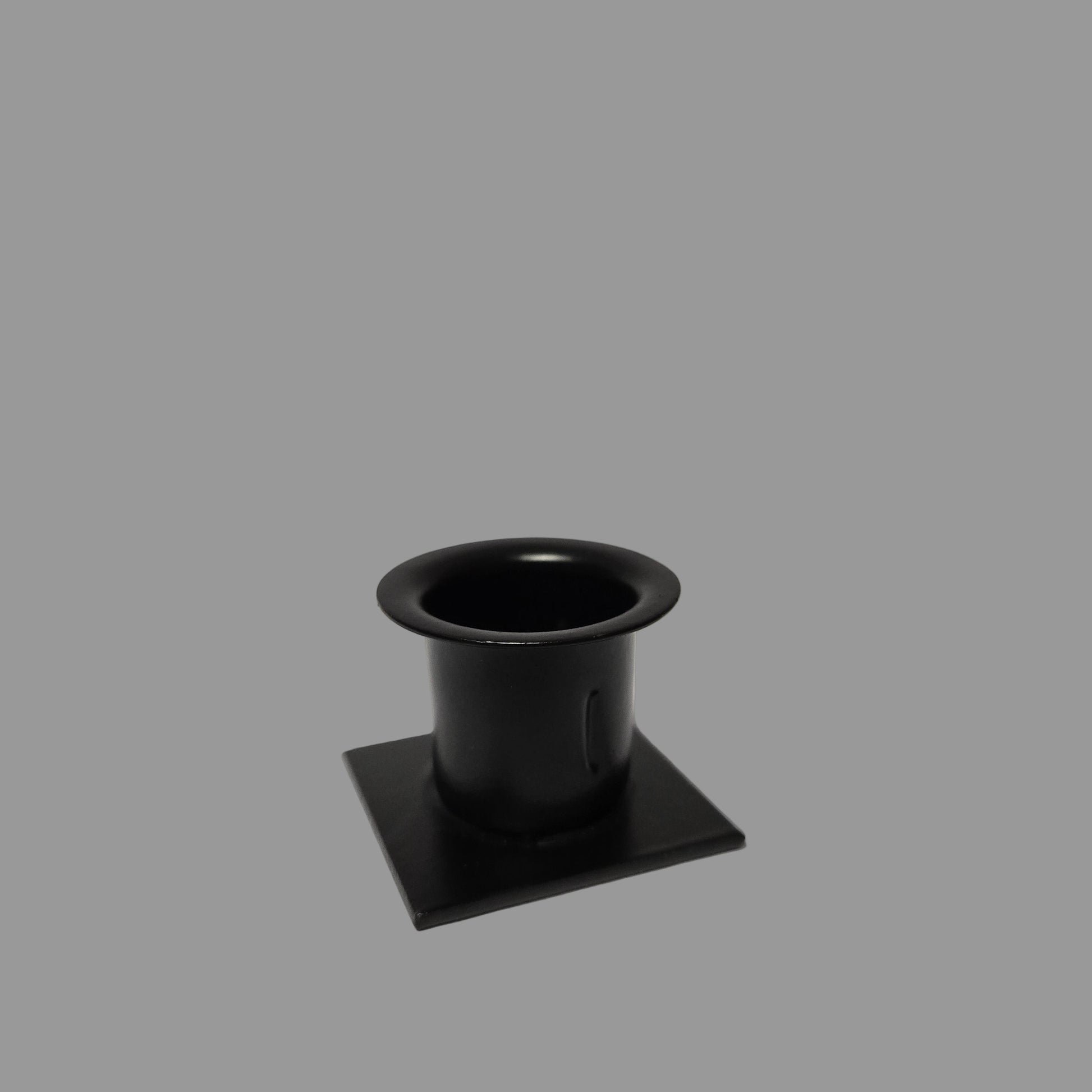 Black metal candle holder with square bottom