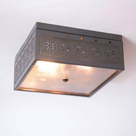 Decorative ceiling light fixture with intricate design on a white background
