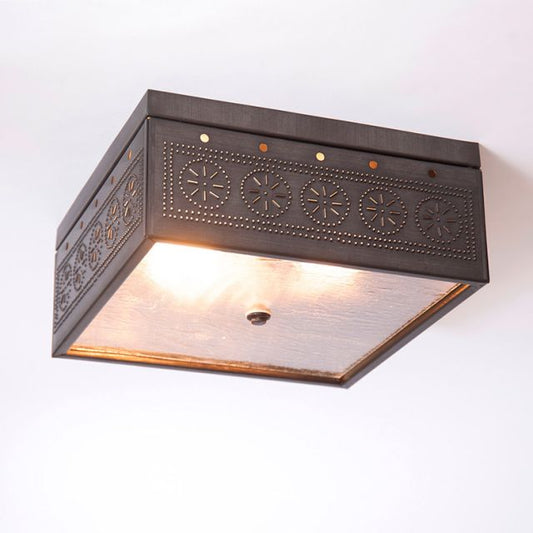 Decorative ceiling light fixture with intricate design on a white background