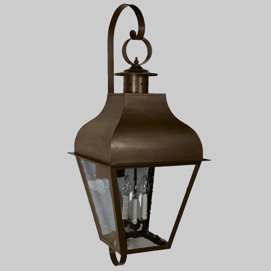 Bronze outdoor wall lantern on a white background