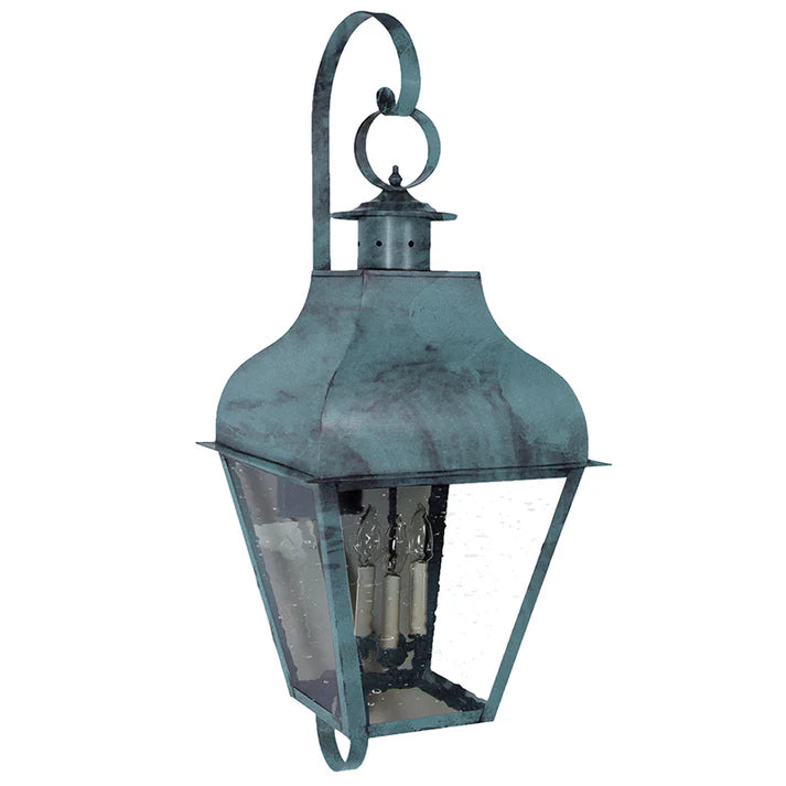 Vintage-style metal lantern with a textured surface on a white background