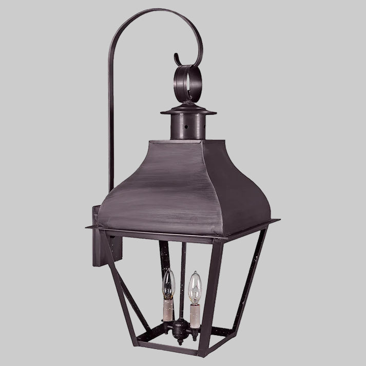 Vintage-style outdoor lamp with metallic finish on a white background