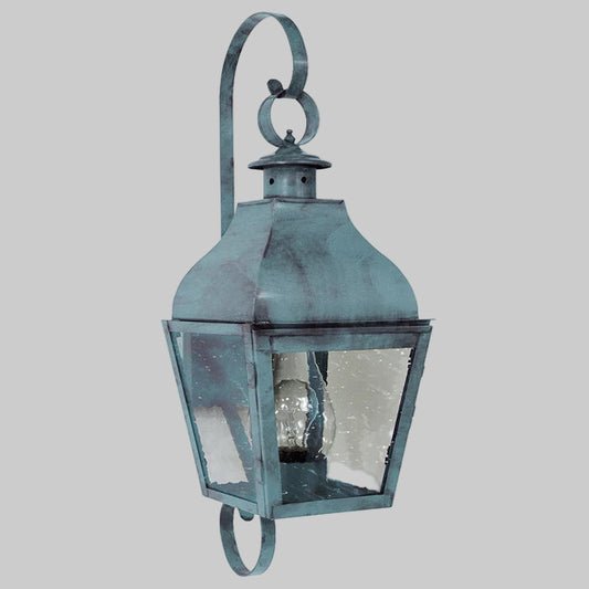 Vintage-style wall lantern with glass cover on a white background