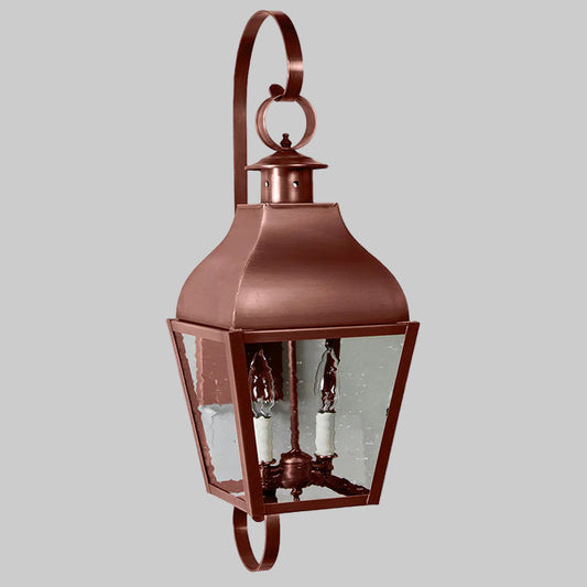 Copper outdoor wall lantern on a white background