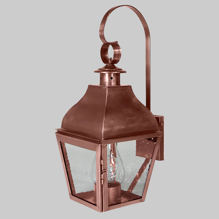 Copper outdoor wall lantern on a white background
