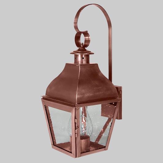 Copper outdoor wall lantern on a white background