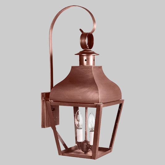 Copper outdoor wall lantern on a white background
