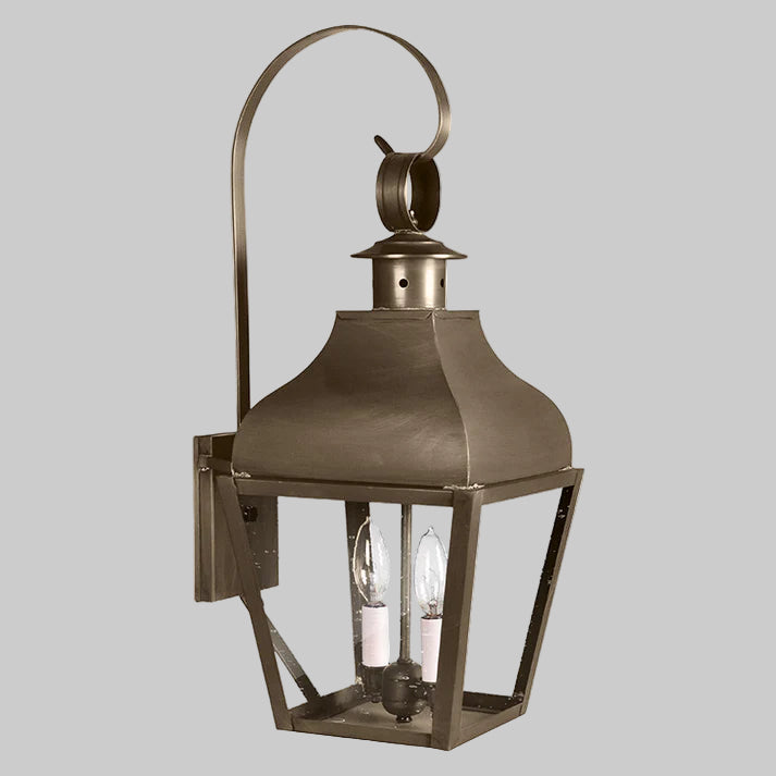 Bronze outdoor wall lantern on a white background