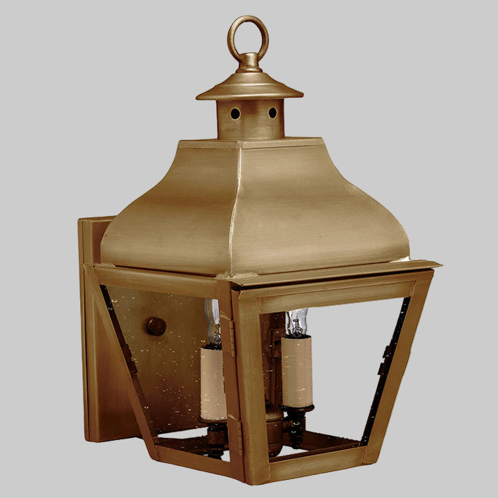 Bronze outdoor lantern on a gray background