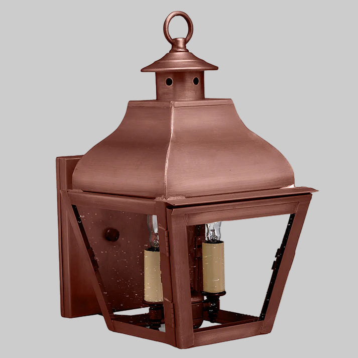 Copper outdoor lantern on a gray background