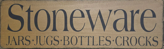 Wooden sign with 'Stoneware' text on a wooden background