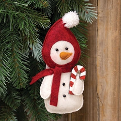 Felt snowman ornament with red hat and scarf, candy cane, on Christmas tree.