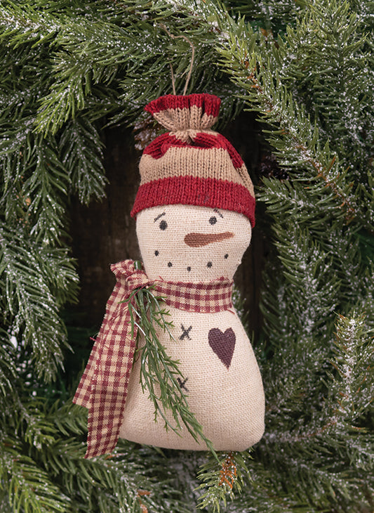 Stuffed striped hat snowman ornament with checked hat and scarf hanging in wreath