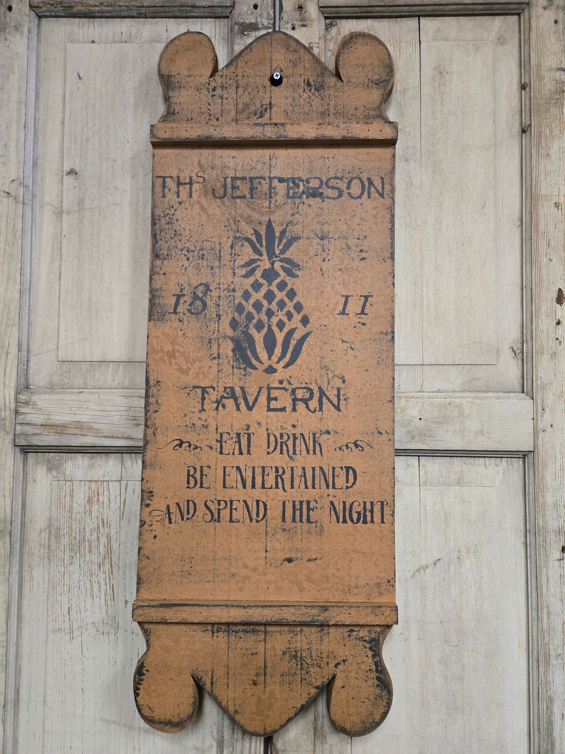 Vintage wooden sign with text and logo on a wooden background