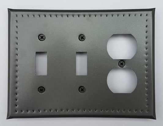 A tin double switch/single outlet border punch with two switch cutouts and one outlet, featuring a gray color and metal material.