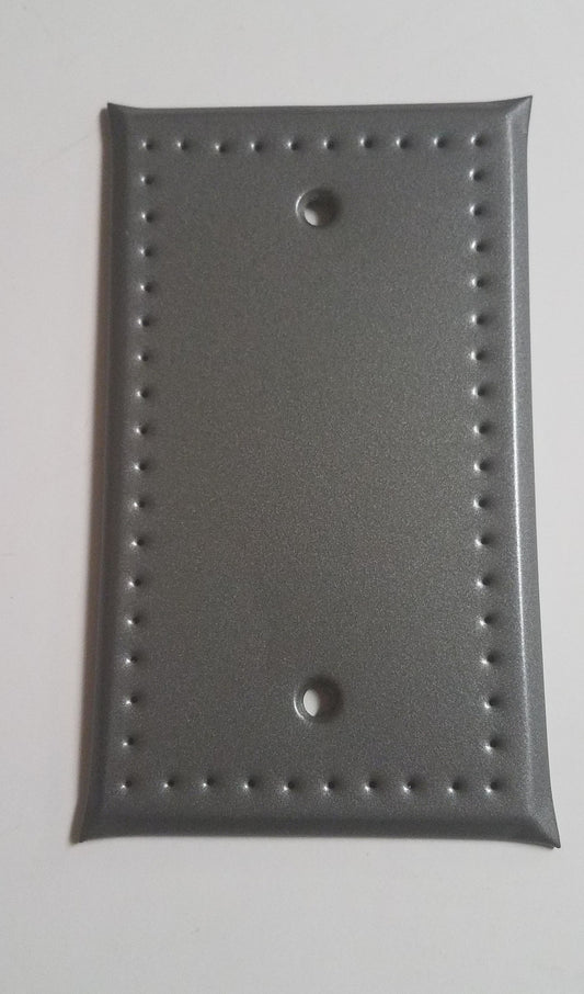 Punched tin cover with no holes for switches or outlets