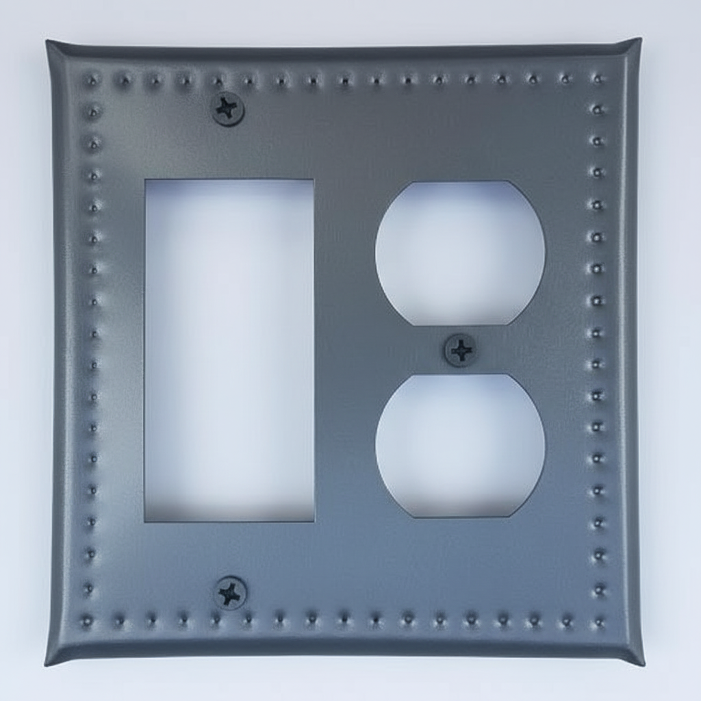 Decorative wall plate with two outlets on a light gray background