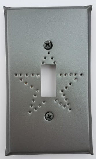 Grey switchplate cover with a punched star at the cutout