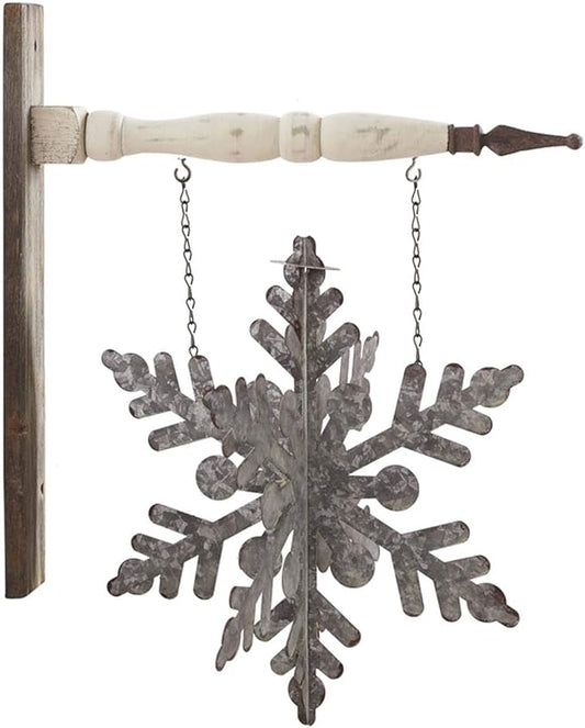 A silver tin snowflake arrow replacement hanging from chains, designed to be attached to a wooden arrow shaft.