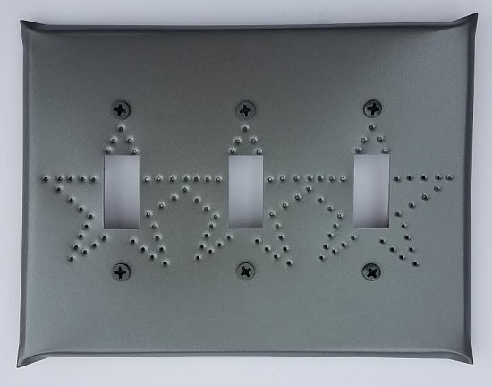 Switchplate cover with three cutouts and punched with a star design