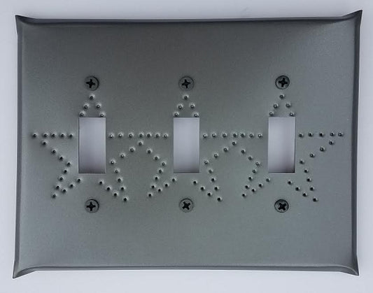 Switchplate cover with three cutouts and punched with a star design