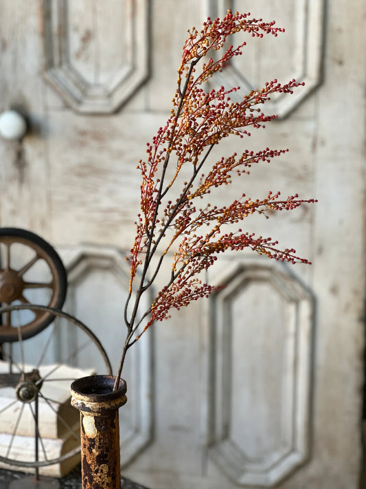 A faux Torchlight berries spray with shades of orange and mustard tones, designed for home decor.