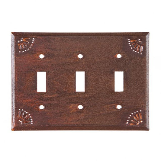 A rustic style triple switch cover made of tin with a matte lacquer protective coating, featuring a chisel design around the edges.