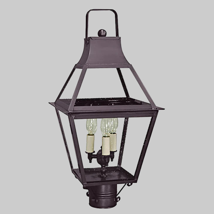 Decorative outdoor lamp with three light bulbs on a gray background