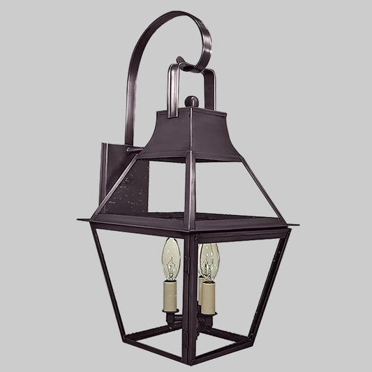 Decorative outdoor wall light fixture on a gray background