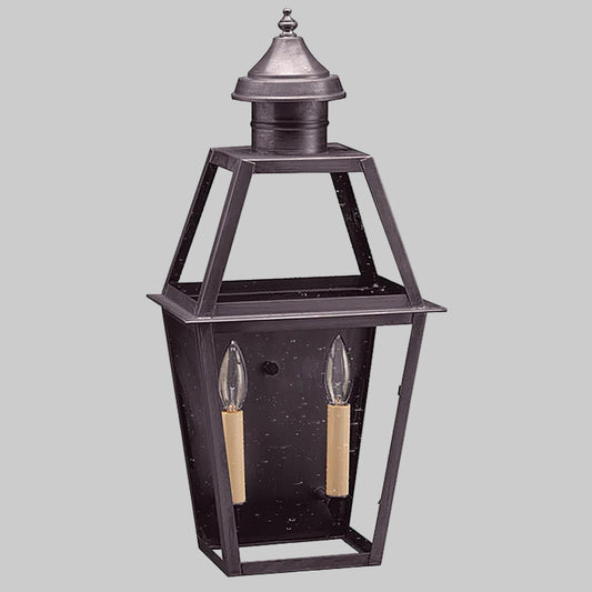 Decorative outdoor lantern with two candle holders on a white background