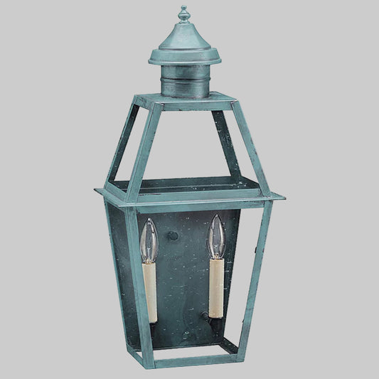 Decorative outdoor lantern with two candle-like lights on a white background