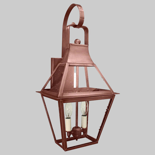 Copper outdoor wall light fixture on a gray background