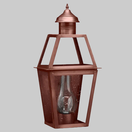 Copper lantern with clear glass on a white background