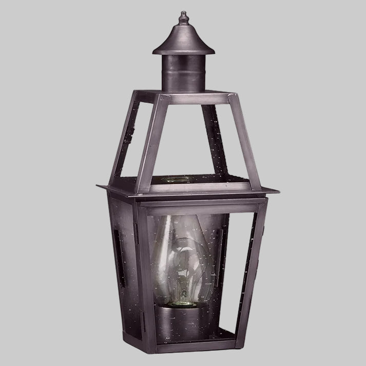 Vintage-style outdoor lantern on a white background