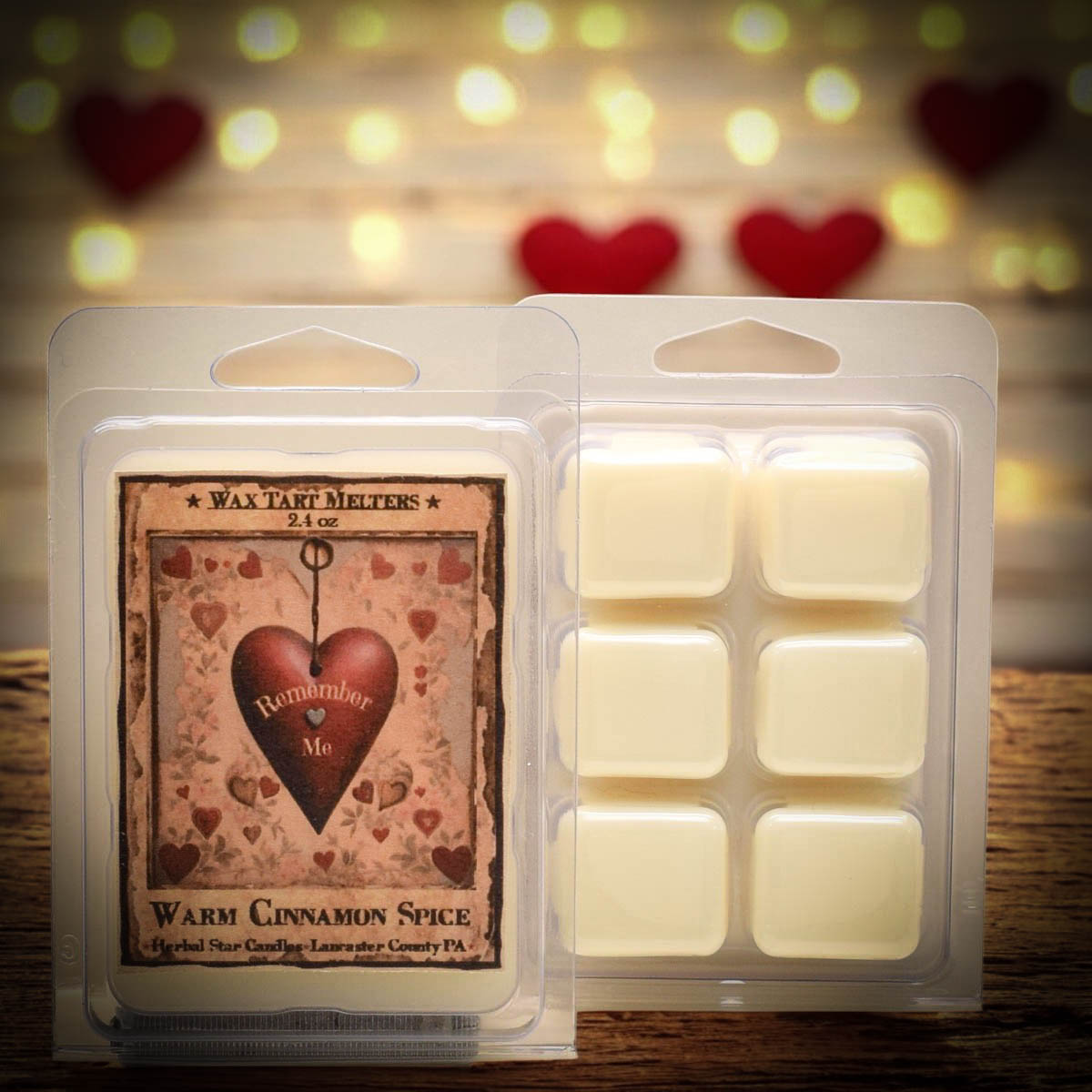 Clear packaging of wax tart melters with artwork of a heart and text